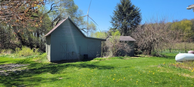 4131 W Meisenheimer Rd, Ludington, MI 49431 - view of barn with a yard