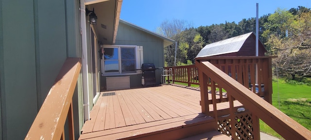 4131 W Meisenheimer Rd, Ludington, MI 49431 - deck with a grill