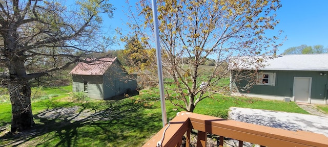 4131 W Meisenheimer Rd, Ludington, MI 49431 - view of yard with an outbuilding and a storage unit