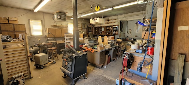 4131 W Meisenheimer Rd, Ludington, MI 49431 - misc room featuring a workshop area and concrete flooring
