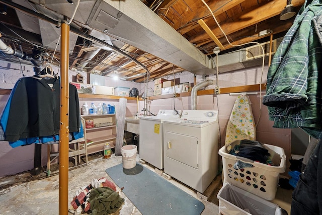 laundry area with independent washer and dryer