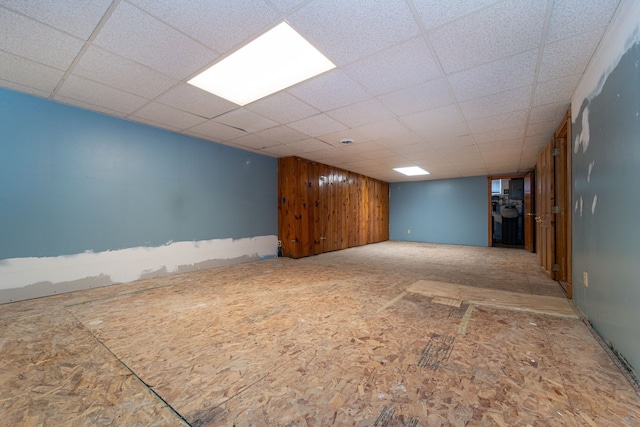 finished below grade area with a paneled ceiling