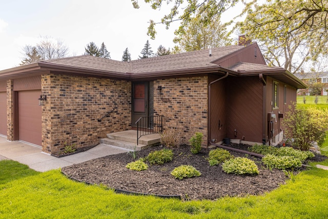 view of front of house featuring an attached garage, brick siding, a chimney, roof with shingles, and concrete driveway