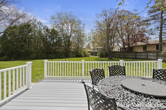 wooden terrace with outdoor dining space