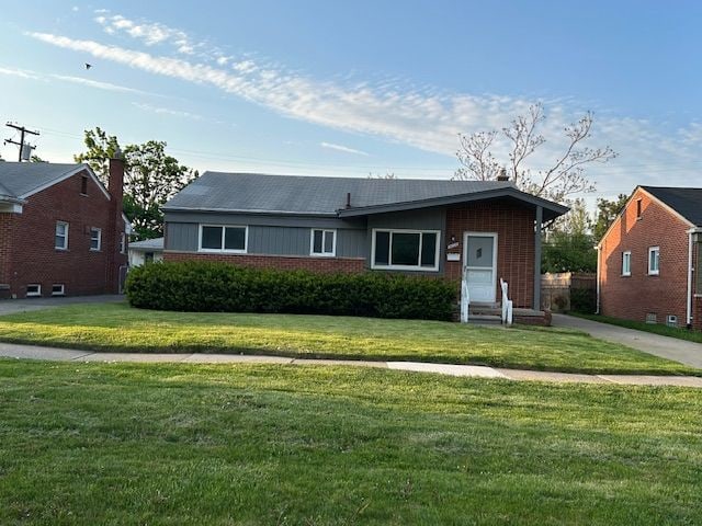 3608 W Webster Rd, Royal Oak, MI 48073 - single story home featuring a front lawn and brick siding