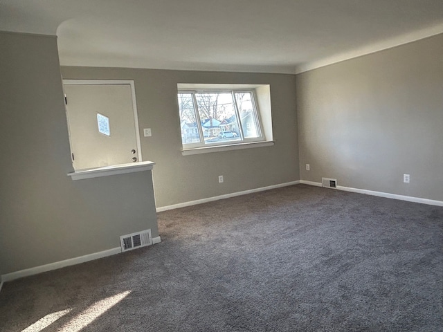 3608 W Webster Rd, Royal Oak, MI 48073 - spare room with dark colored carpet and baseboards