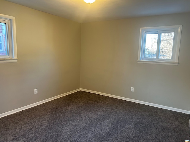 3608 W Webster Rd, Royal Oak, MI 48073 - unfurnished room with dark carpet and baseboards