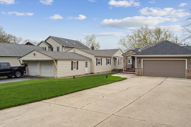 9669 Norman Rd, Clarkston, MI 48348 - view of front of property with a front lawn, concrete driveway, stone siding, an attached garage, and roof with shingles