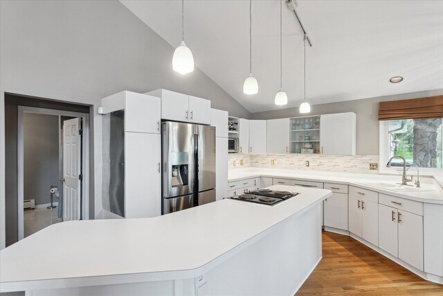 9669 Norman Rd, Clarkston, MI 48348 - kitchen featuring stainless steel refrigerator with ice dispenser, open shelves, black electric cooktop, a sink, and decorative backsplash