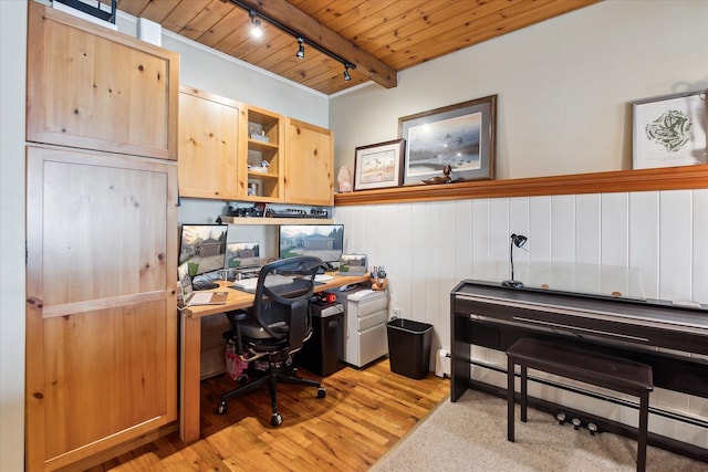9669 Norman Rd, Clarkston, MI 48348 - office featuring light wood-style flooring, track lighting, a baseboard heating unit, wood ceiling, and a wainscoted wall