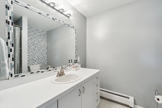 9669 Norman Rd, Clarkston, MI 48348 - full bathroom featuring a baseboard radiator, vanity, toilet, a shower with curtain, and baseboards
