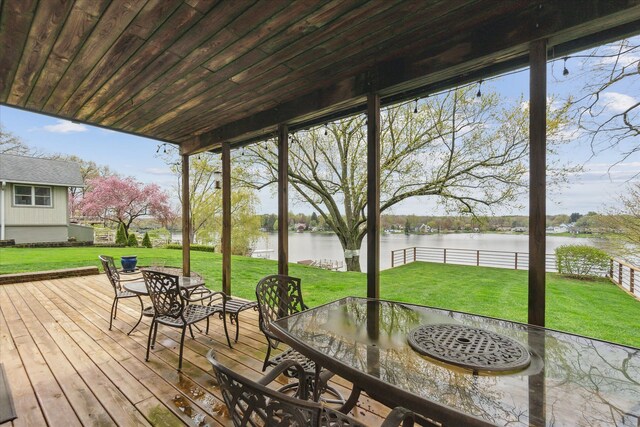 9669 Norman Rd, Clarkston, MI 48348 - wooden terrace featuring outdoor dining space and a water view