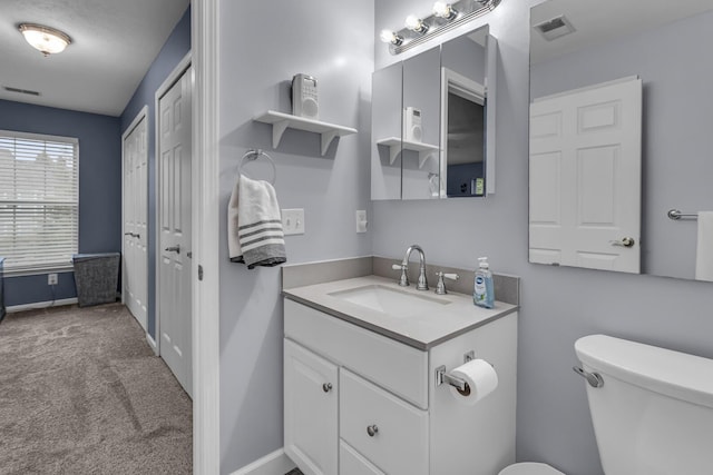 739 W Barrington Cir, Jackson, MI 49203 - half bath with toilet, vanity, and baseboards
