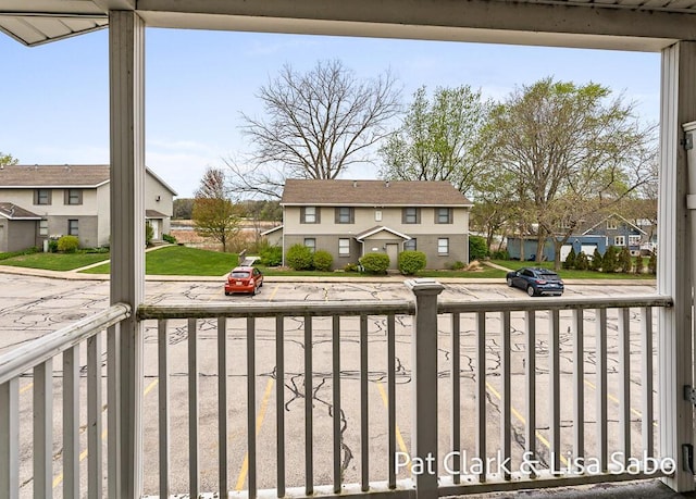 balcony featuring a residential view