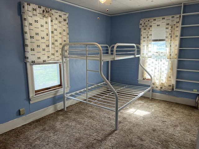 unfurnished bedroom with carpet floors