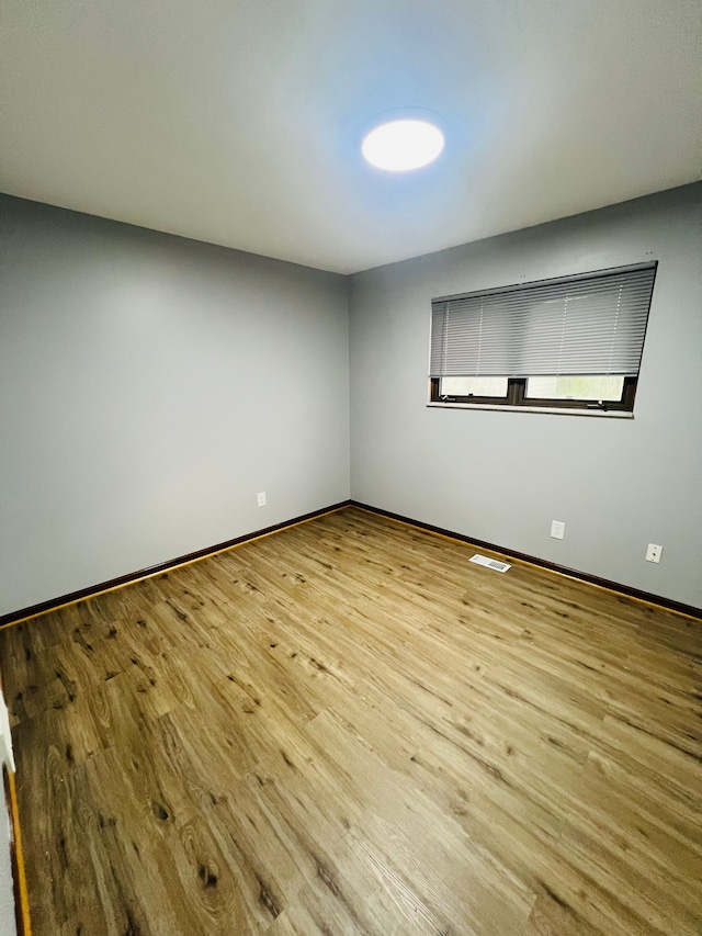 25432 Wexford Ave, Warren, MI 48091 - empty room featuring wood finished floors and baseboards