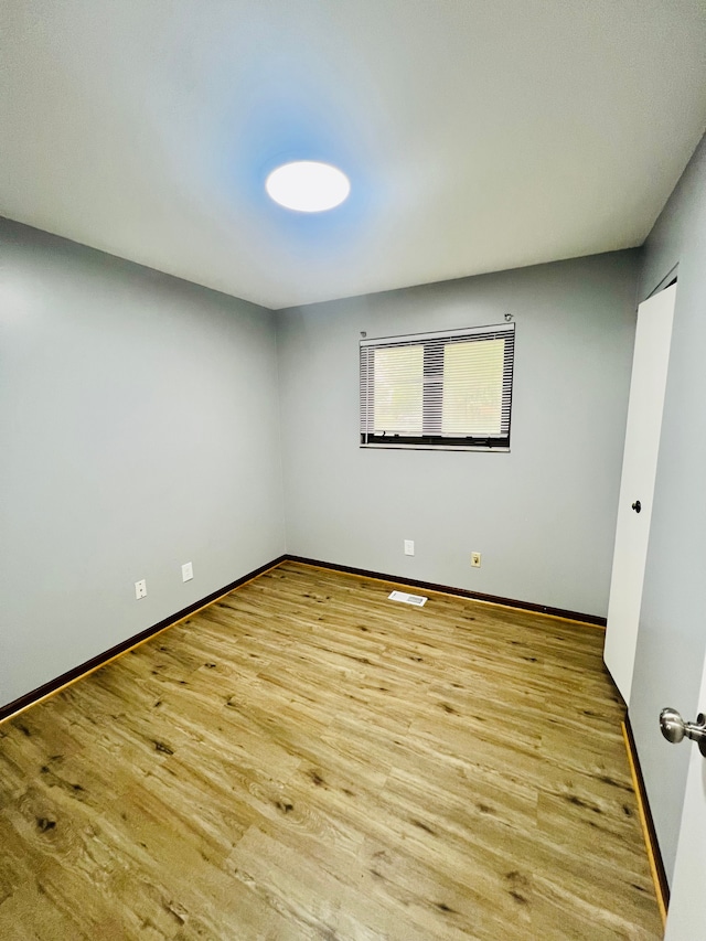 25432 Wexford Ave, Warren, MI 48091 - empty room featuring wood finished floors and baseboards