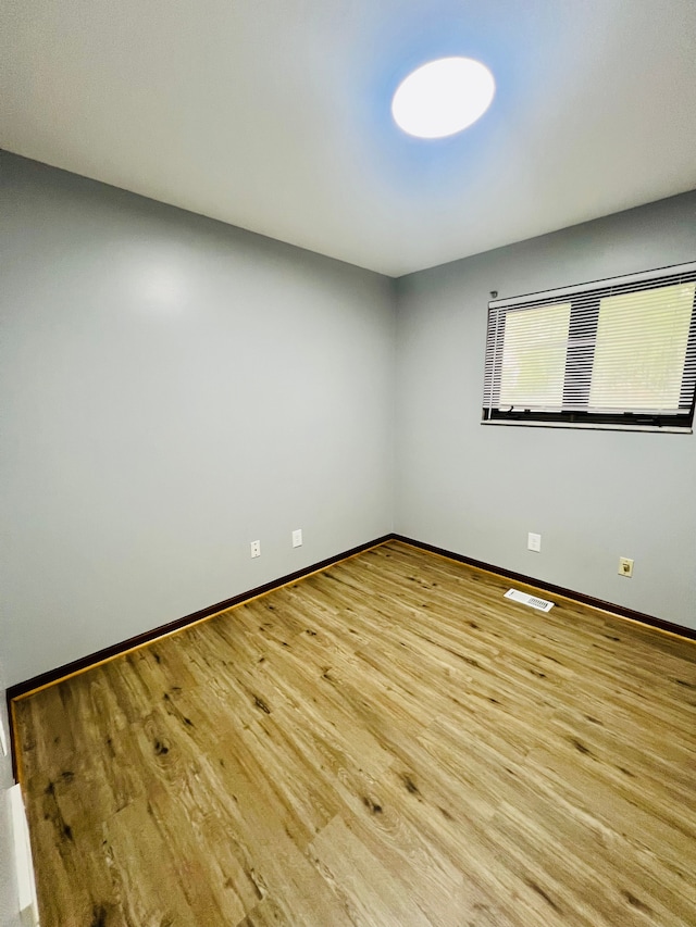 25432 Wexford Ave, Warren, MI 48091 - spare room featuring baseboards and wood finished floors