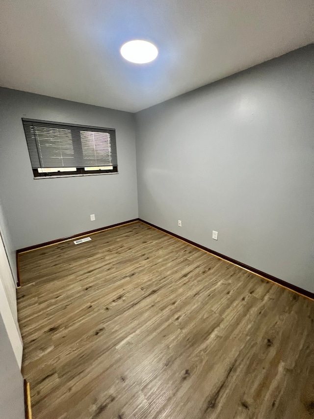 25432 Wexford Ave, Warren, MI 48091 - spare room featuring wood finished floors and baseboards