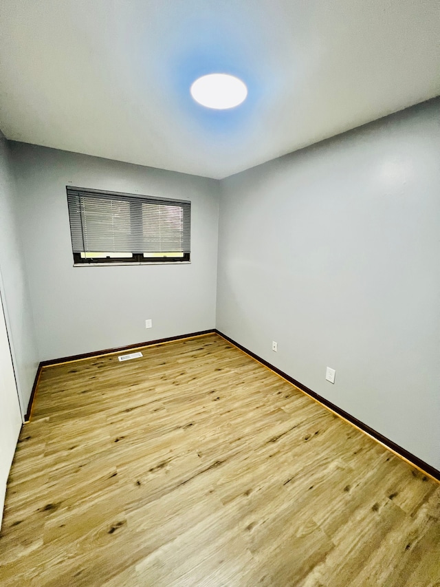 25432 Wexford Ave, Warren, MI 48091 - unfurnished room with wood finished floors and baseboards