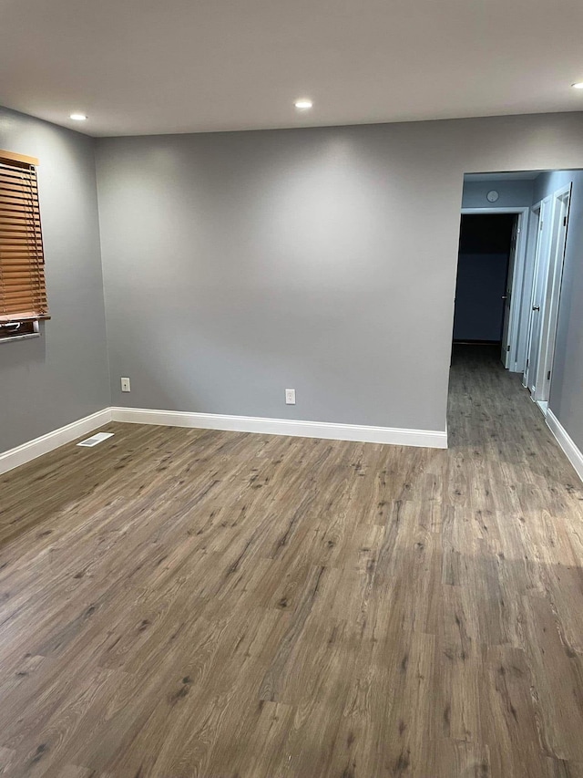 25432 Wexford Ave, Warren, MI 48091 - empty room featuring wood finished floors, baseboards, and recessed lighting
