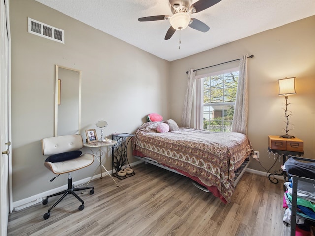 49559 Donovan Blvd, Plymouth, MI 48170 - bedroom featuring light wood finished floors, baseboards, and ceiling fan