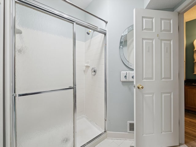 49559 Donovan Blvd, Plymouth, MI 48170 - full bathroom featuring a shower stall, tile patterned flooring, and baseboards