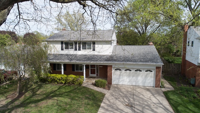 29458 Walker Dr, Warren, MI 48092 - traditional-style home featuring an attached garage, driveway, and brick siding