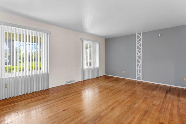 29458 Walker Dr, Warren, MI 48092 - spare room with hardwood / wood-style flooring and baseboards