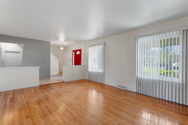 29458 Walker Dr, Warren, MI 48092 - spare room with plenty of natural light and light wood finished floors