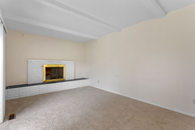 29458 Walker Dr, Warren, MI 48092 - unfurnished living room featuring beam ceiling, carpet floors, a fireplace, and baseboards