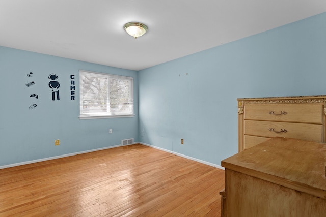29458 Walker Dr, Warren, MI 48092 - spare room featuring light wood-style floors and baseboards