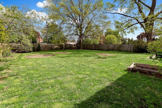 29458 Walker Dr, Warren, MI 48092 - view of yard featuring a vegetable garden