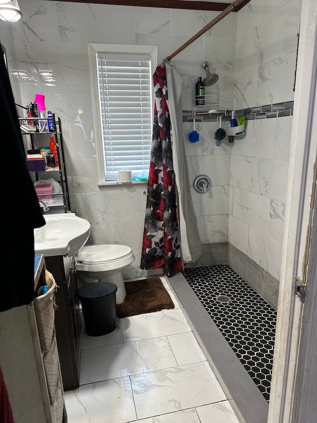 752 E Philadelphia Blvd, Flint, MI 48505 - bathroom with marble finish flooring, a stall shower, toilet, and a sink