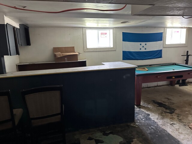 752 E Philadelphia Blvd, Flint, MI 48505 - miscellaneous room featuring unfinished concrete flooring and pool table
