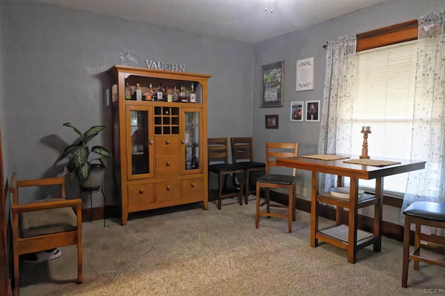 view of carpeted dining space