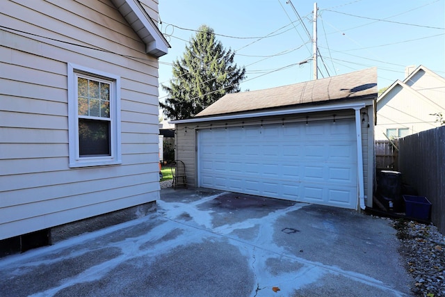 detached garage with fence