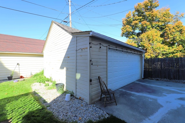 detached garage with fence