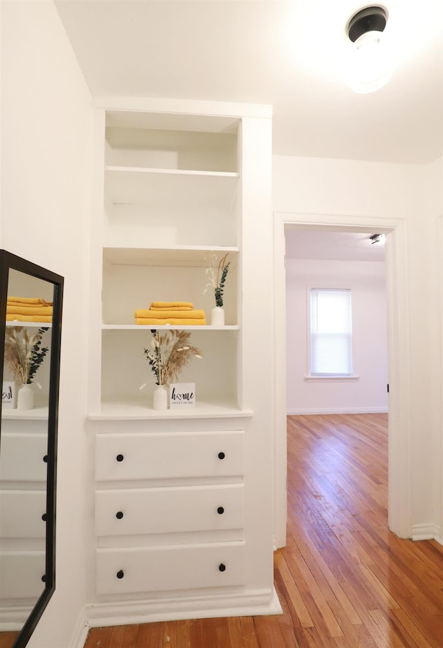 detailed view of wood finished floors and baseboards