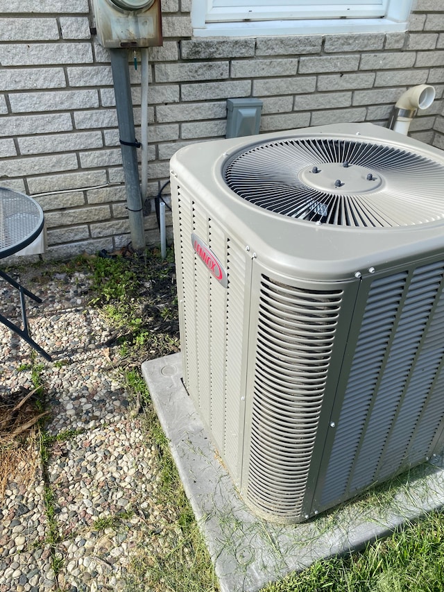 exterior view of cooling unit and electric meter