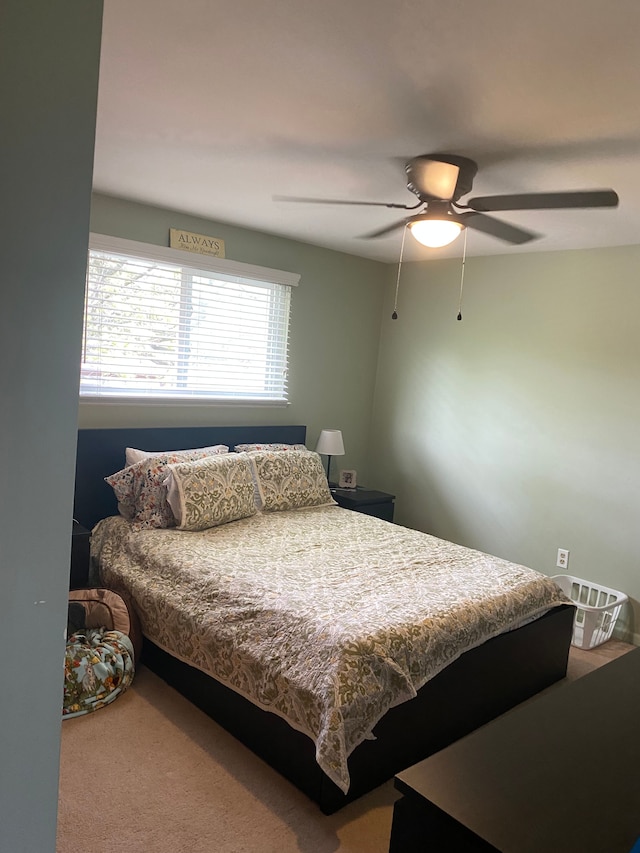 bedroom featuring carpet floors and ceiling fan