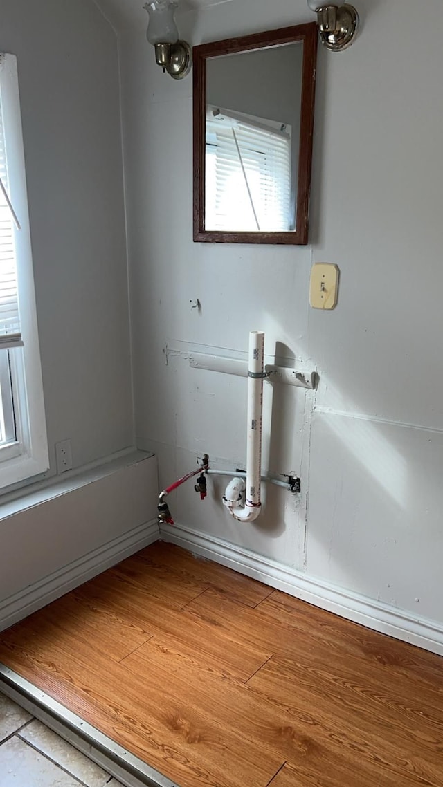 detailed view of wood finished floors and baseboards