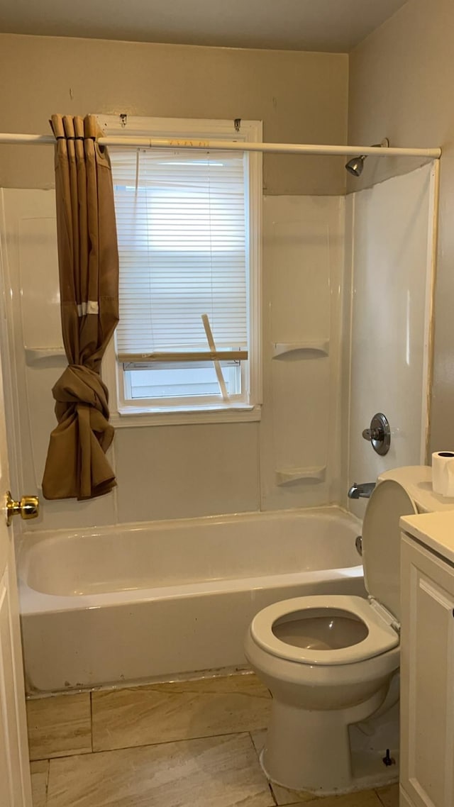 bathroom with shower / bath combination, toilet, vanity, and wood finished floors