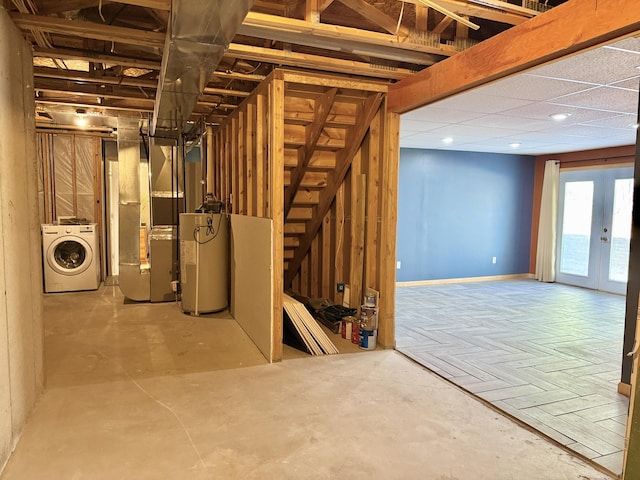 2184 Sugaridge Dr, Muskegon, MI 49445 - basement featuring washer / clothes dryer, water heater, heating unit, baseboards, and recessed lighting