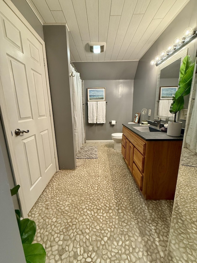 2184 Sugaridge Dr, Muskegon, MI 49445 - full bath featuring toilet, vanity, a shower with shower curtain, and wood ceiling