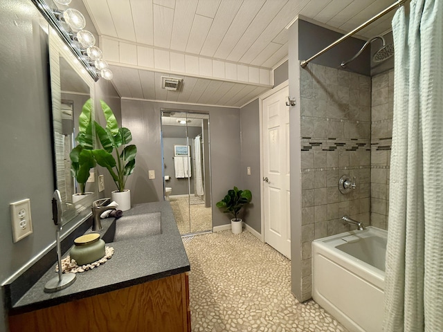 full bathroom featuring shower / bath combo with shower curtain, wooden ceiling, vanity, and baseboards