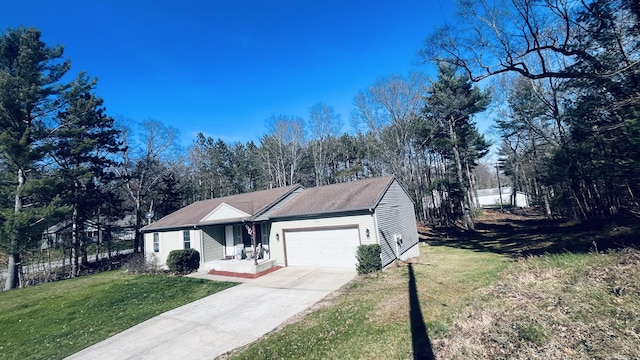 ranch-style home with an attached garage and driveway