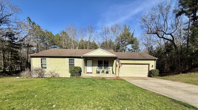 ranch-style home with a garage, covered porch, a front lawn, and concrete driveway