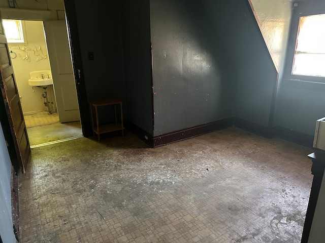 additional living space with a sink