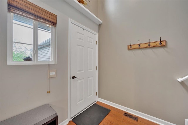 4661 Christopher Pines Dr, Clarkston, MI 48346 - foyer featuring wood finished floors and baseboards
